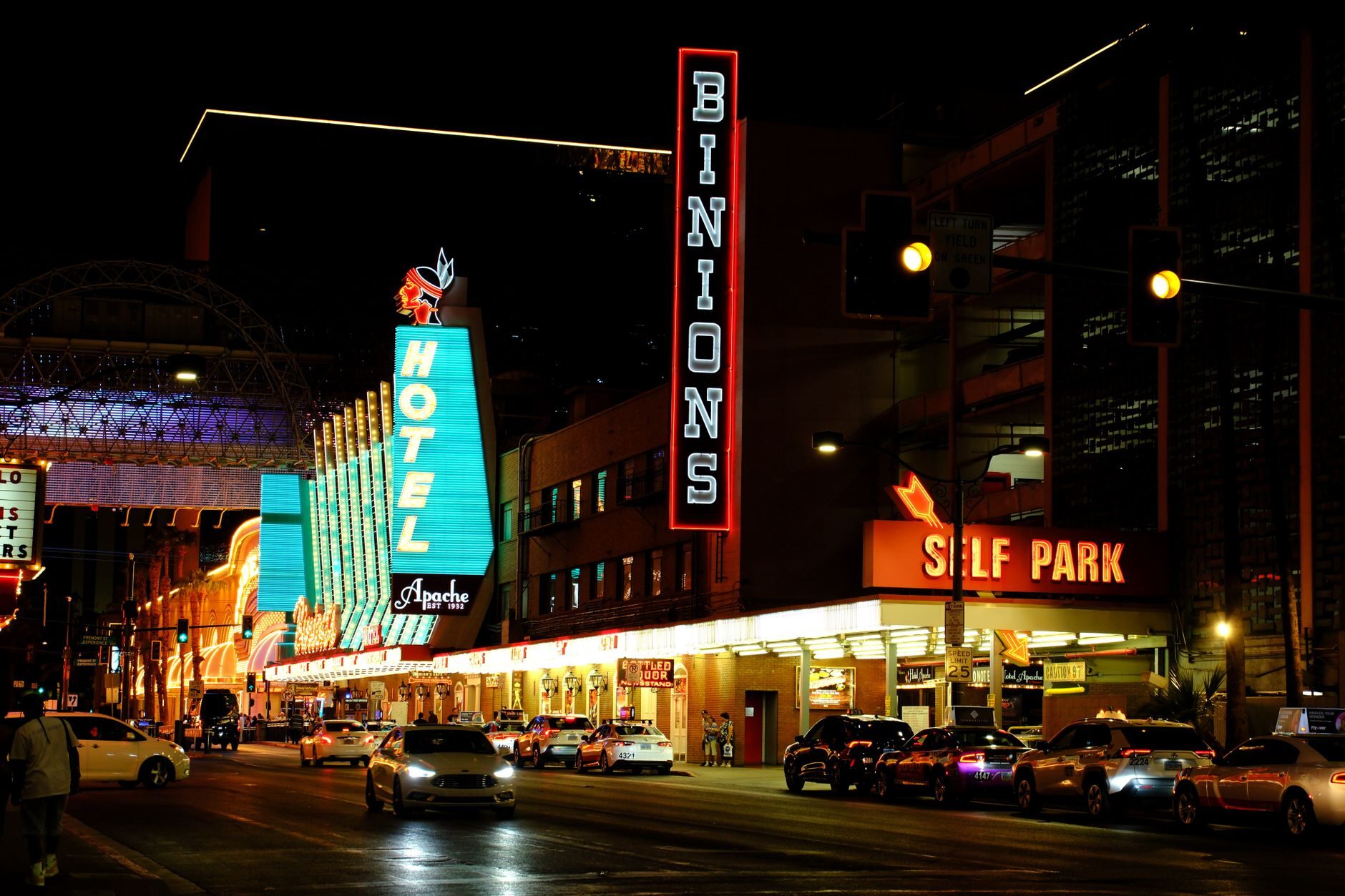 Old-school neon signs on Fremont Street in Downtown Las Vegas at night.